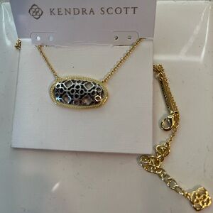 Kendra Scott Filigree Dollie Pendant Necklace in Gold And Silver. New. Not used.